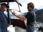 Predator Charters - Skipper letting you kiss your catch!